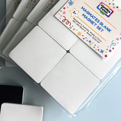 Blank magnetic tiles with a packaging label on a light blue surface