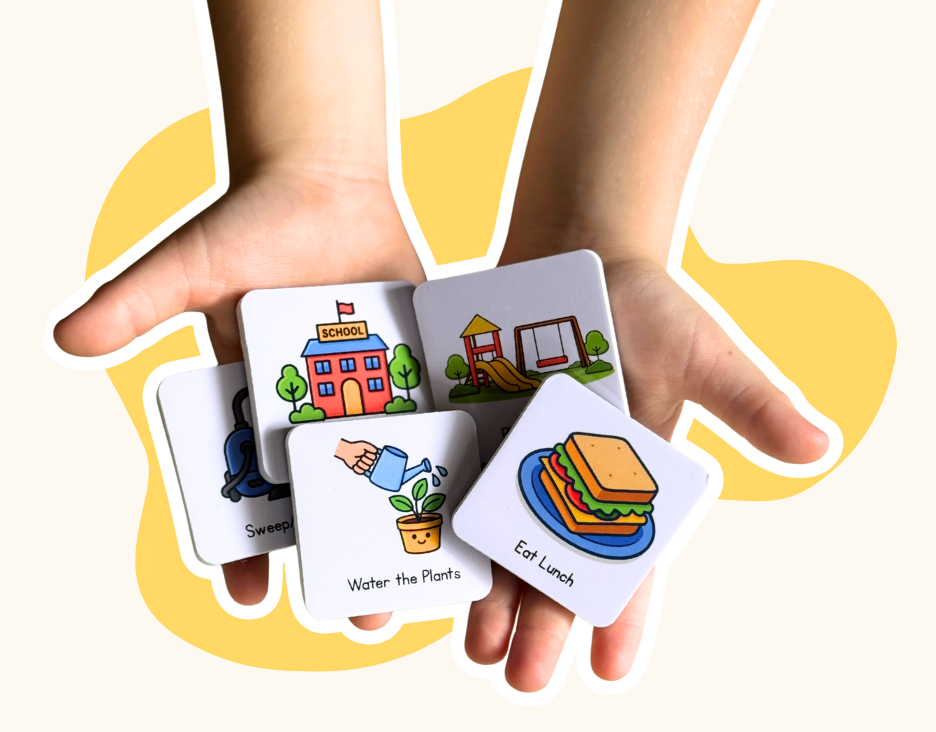 Hands holding a set of MagMates Magnets with illustrations on a white background
