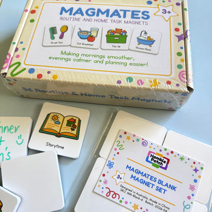 A box of MagMates Routine and Home Task Magnets and a set of MagMates Blank Magnets on a blue background with a couple of the magnets positioned beside them.