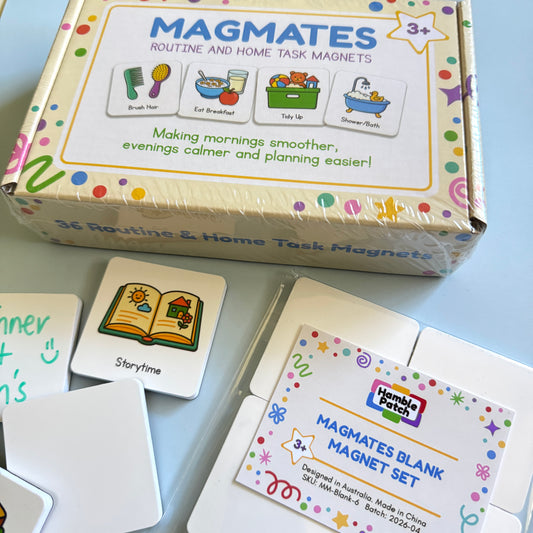 A box of MagMates Routine and Home Task Magnets and a set of MagMates Blank Magnets on a blue background with a couple of the magnets positioned beside them.