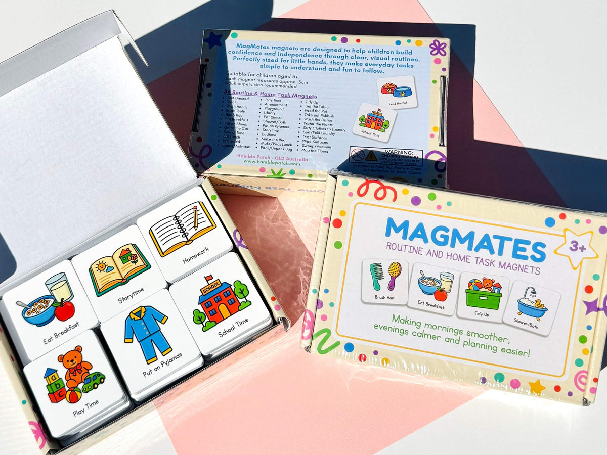 A boxed set of colorful children's task magnets shown open, with one magnet set displayed inside a white box and the package front visible beside it. The magnets feature illustrated icons for activities like Eat Breakfast, Show Play, Homework, and Play Time.